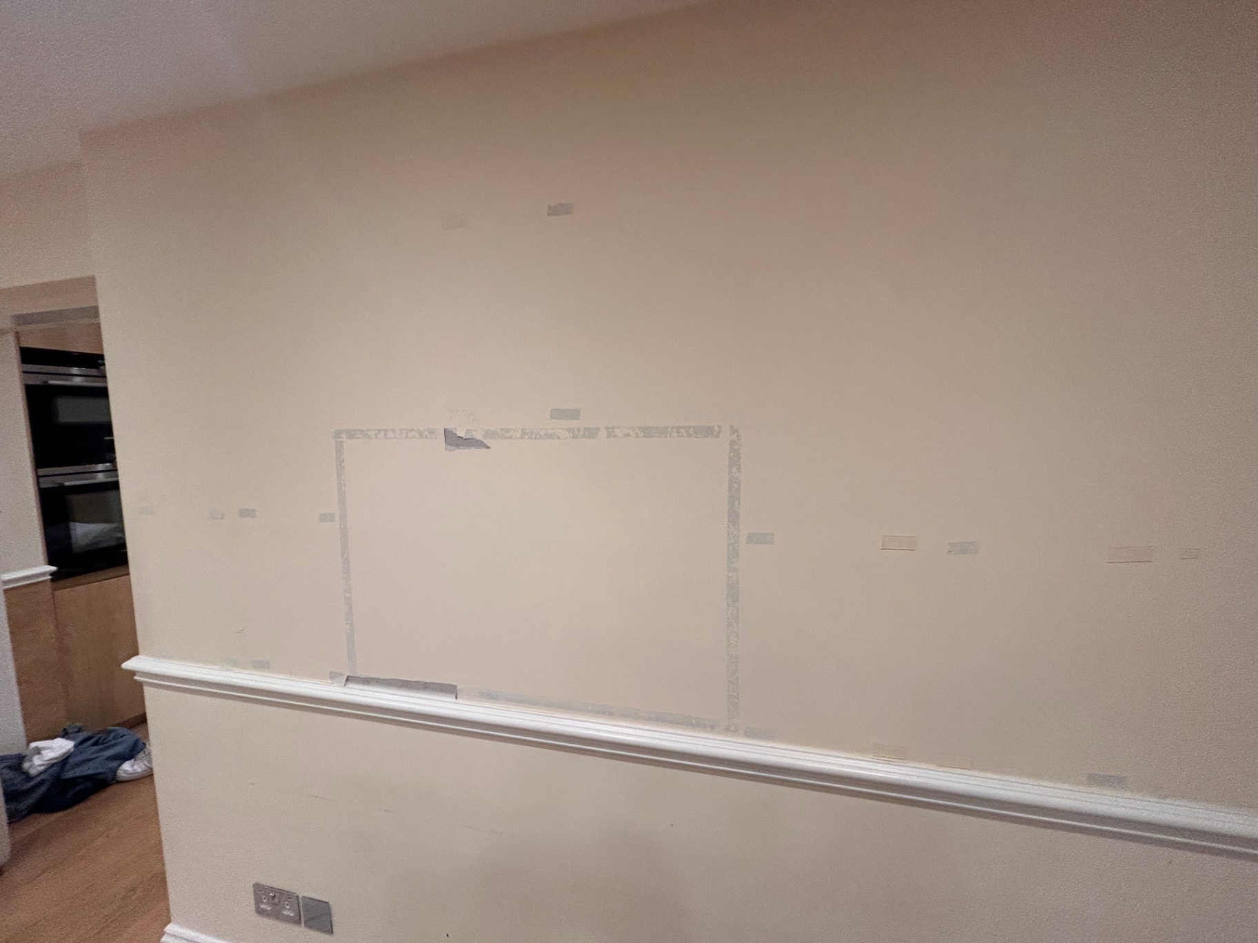 Before photo — Belgravia garden-level room — full repaint in f&b tallow 203, showing the room in its original condition prior to preparation and painting by The Painters London.